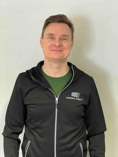Ykä Marjanen, CEO of Manna Insect Oy, wearing a Manna Insect jacket.